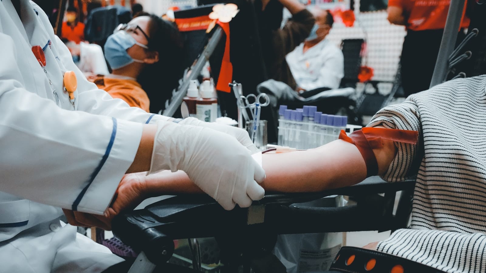 Phlebotomist performing a blood draw