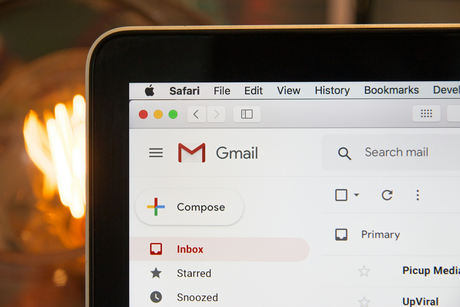 Gmail inbox open on a MacBook laptop